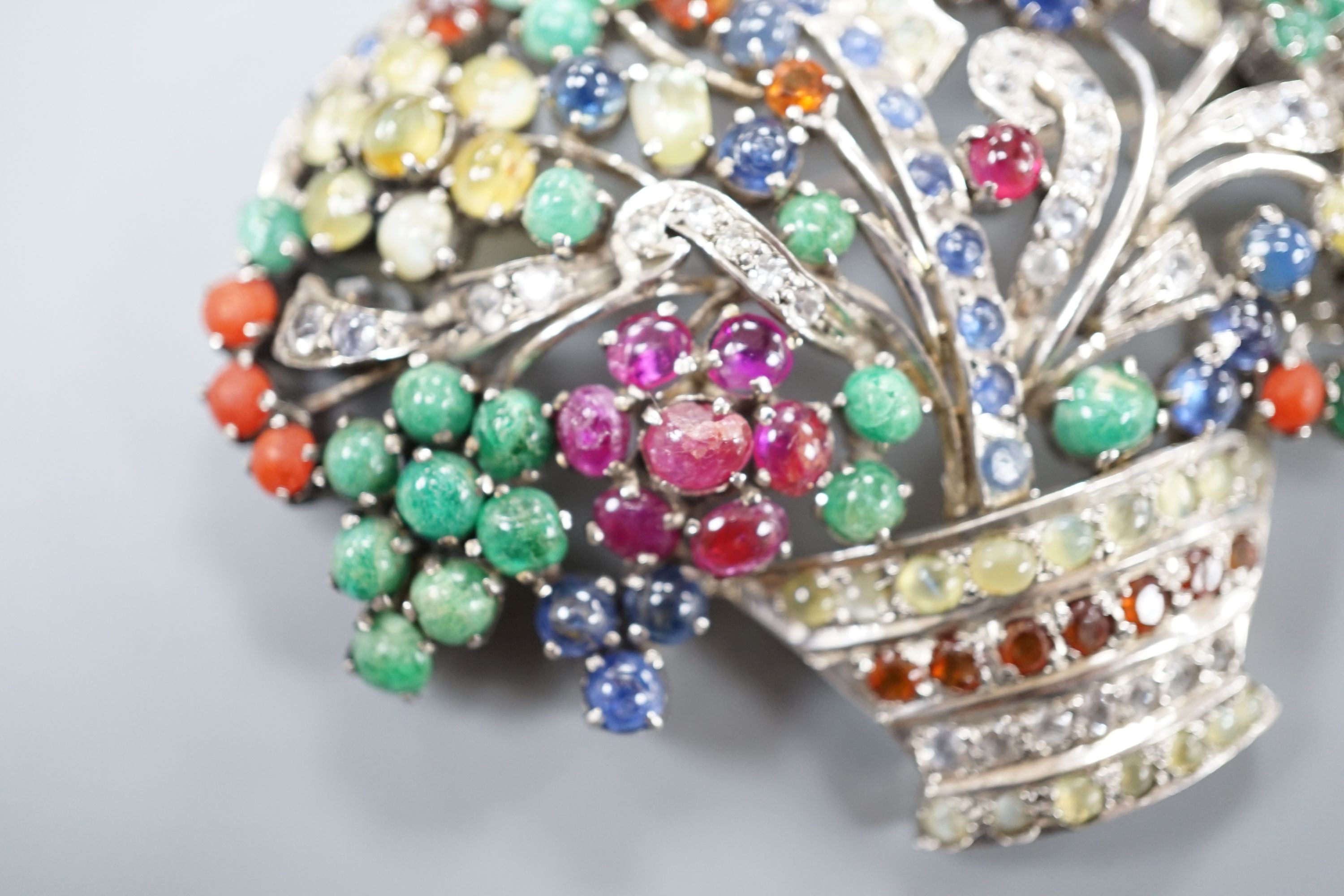 A white metal and multi gem set giardinetto brooch, width 7cm.